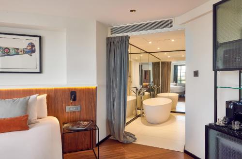 Suite Junior The Level con acceso al salón executive del hotel Level At Melia White House. Foto 18