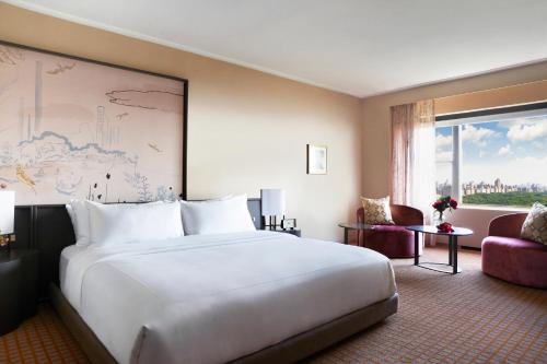 Habitación Park con cama extragrande y vistas del hotel Park Lane New York. Foto 6