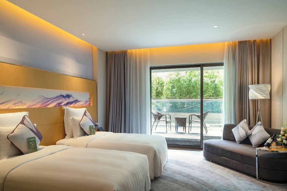 Habitación Deluxe con Dos Camas Individuales y Balcón del hotel Novotel Suzhou Sip. Foto 2
