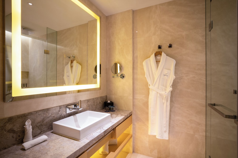 Habitación Deluxe con Dos Camas Individuales y Balcón del hotel Novotel Suzhou Sip. Foto 6