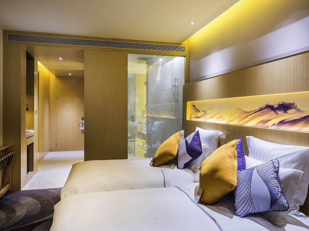 Habitación superior con 2 camas individuales del hotel Novotel Suzhou Sip