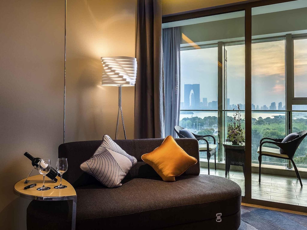 Habitación Deluxe con 1 cama king del hotel Novotel Suzhou Sip. Foto 3