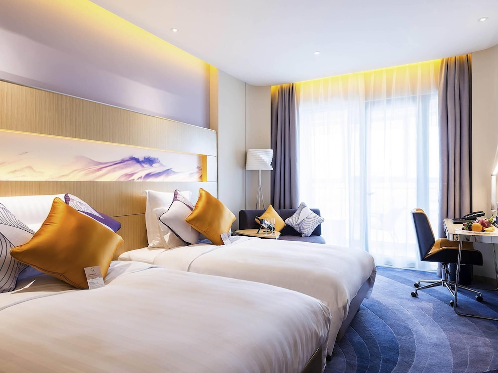 Habitación Premier con 2 camas individuales del hotel Novotel Suzhou Sip. Foto 4
