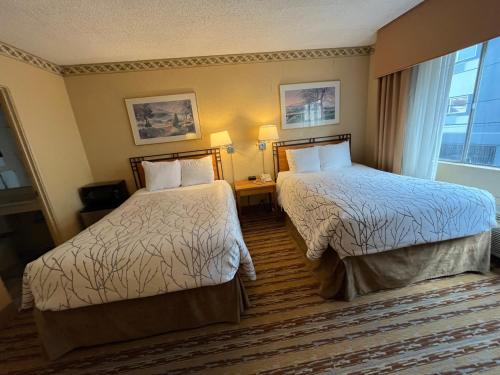 Habitación Doble con 2 camas dobles - No fumadores del hotel Travelodge by Wyndham Seattle By The Space Needle. Foto 8