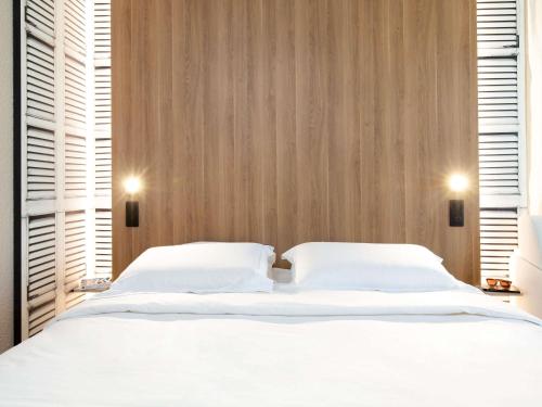Habitación Estándar con 1 cama doble y 1 sofá cama del hotel Novotel Aix En Provence Beaumanoir Les 3 Sautets. Foto 5