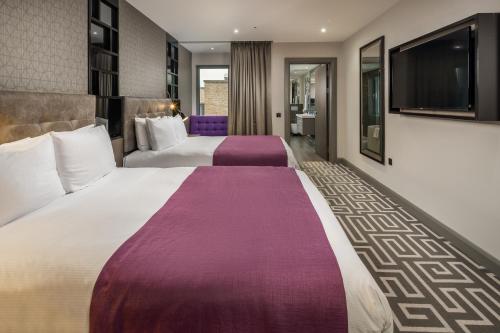 Suite Familiar Hoxton del hotel COURTHOUSE SHOREDITCH. Foto 1