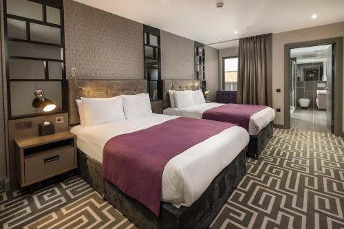 Suite Familiar Hoxton del hotel COURTHOUSE SHOREDITCH. Foto 2