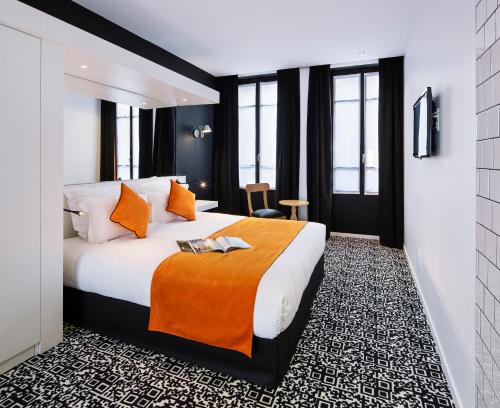 Suite Junior con sofá cama - Cama doble grande del hotel Best Western Premier Faubourg 88. Foto 3