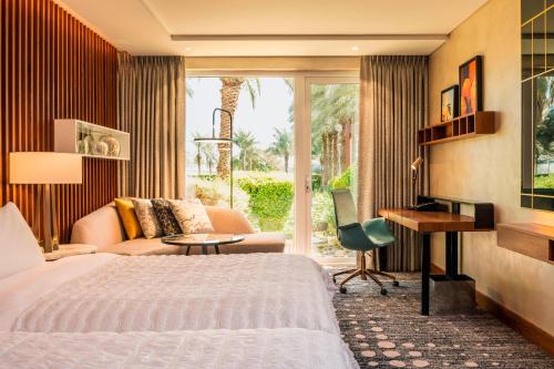 Habitación Doble Deluxe con vistas al jardín - 2 camas individuales del hotel Le Meridien Dubai and Conference Centre. Foto 1