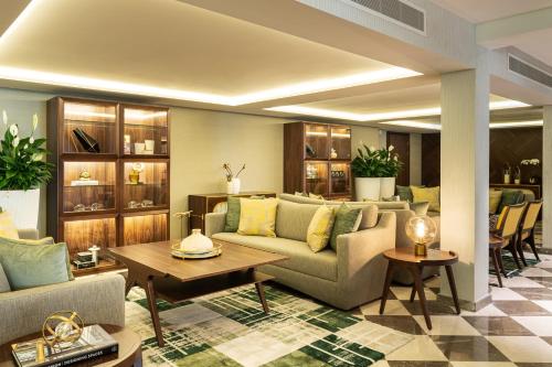 Le Royal Club Twin Room, Larger Room, with Executive Lounge Access del hotel Le Meridien Dubai and Conference Centre. Foto 7