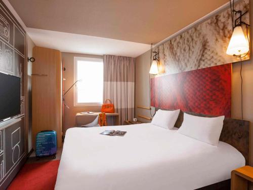 Habitación Confort - 1 cama doble y 1 cama individual del hotel Ibis Paris Porte De Clichy Centre