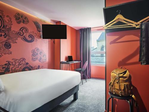 Habitación Doble Estándar del hotel Ibis Styles Paris Gare De L'est Magenta. Foto 3