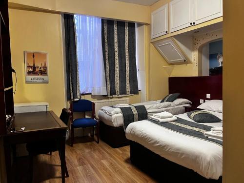 Habitación Triple del hotel Dolphin. Foto 16