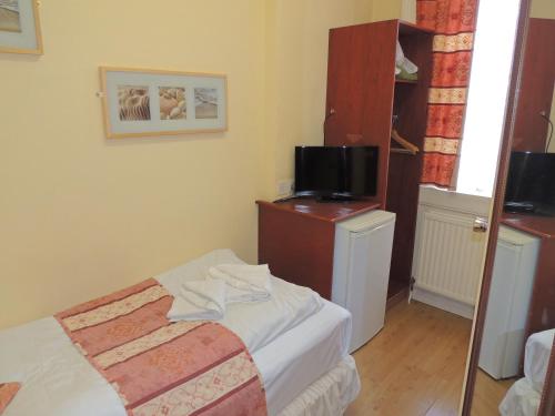 Habitación Individual del hotel Dolphin. Foto 1