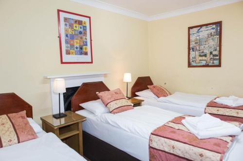 Habitación Triple del hotel Shakespeare. Foto 6