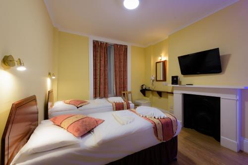 Habitación Triple del hotel Shakespeare. Foto 7