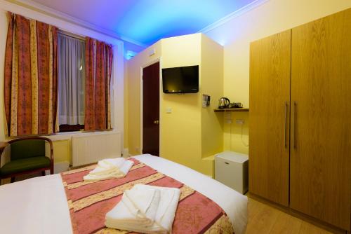 Habitación cuádruple del hotel Shakespeare. Foto 7