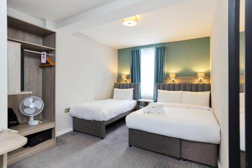 Habitación Triple del hotel Prince William. Foto 1