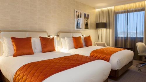 Habitación Doble Premium con 2 camas dobles del hotel CROWNE PLAZA - LONDON KINGS CROSS. Foto 3