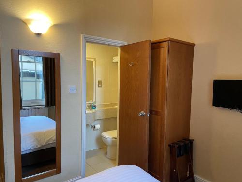 Habitación Individual Estándar del hotel Orchard. Foto 4