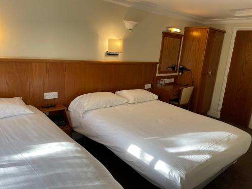 Habitación Triple Estándar del hotel Orchard. Foto 5