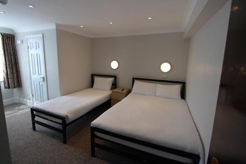 Habitación Triple Superior - 1 cama doble y 1 individual del hotel Lords. Foto 2