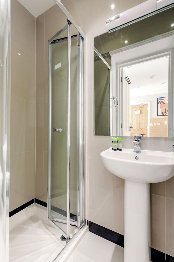 Habitación individual, baño privado del hotel Mina House. Foto 6
