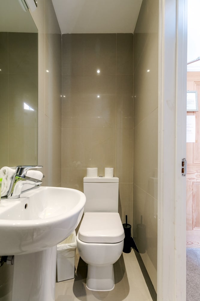 Habitación individual, baño privado del hotel Mina House. Foto 18