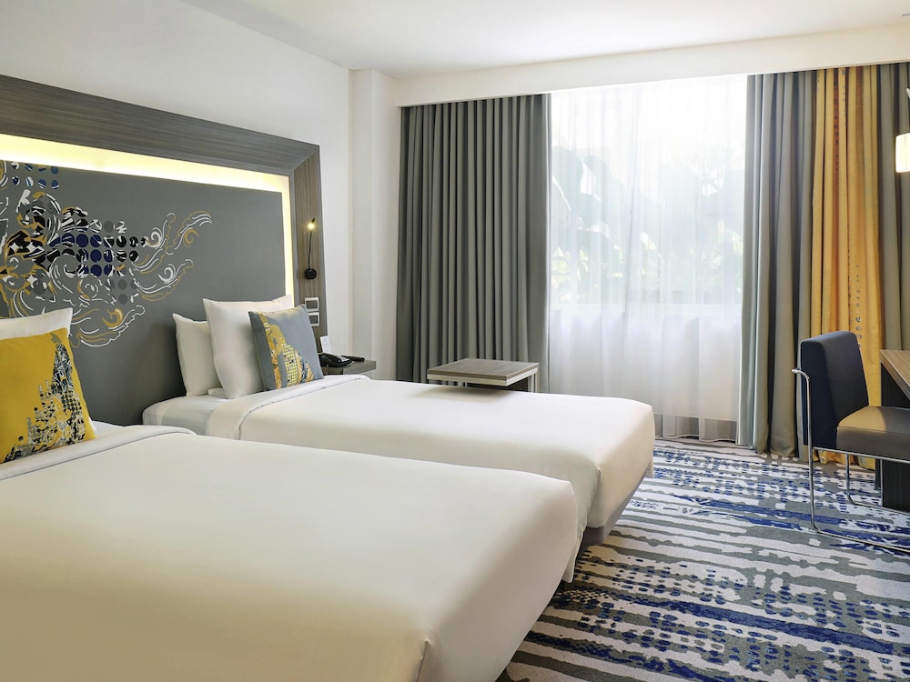 Habitación superior con 2 camas individuales del hotel Novotel Bali Ngurah Rai Airport. Foto 3