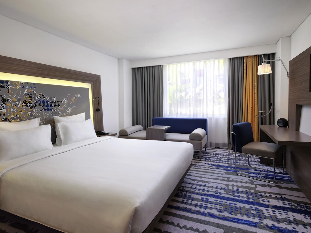Habitación ejecutiva con 1 cama king size del hotel Novotel Bali Ngurah Rai Airport