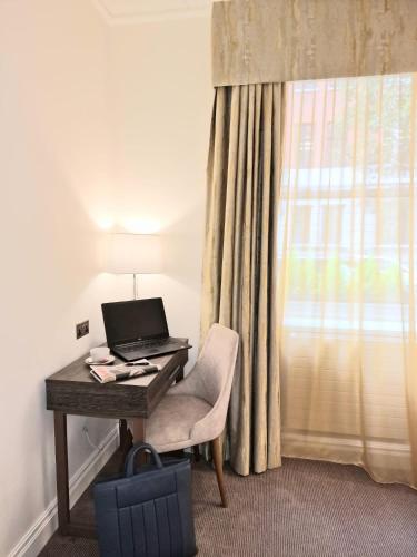 Habitación Doble del hotel Astor Court. Foto 3
