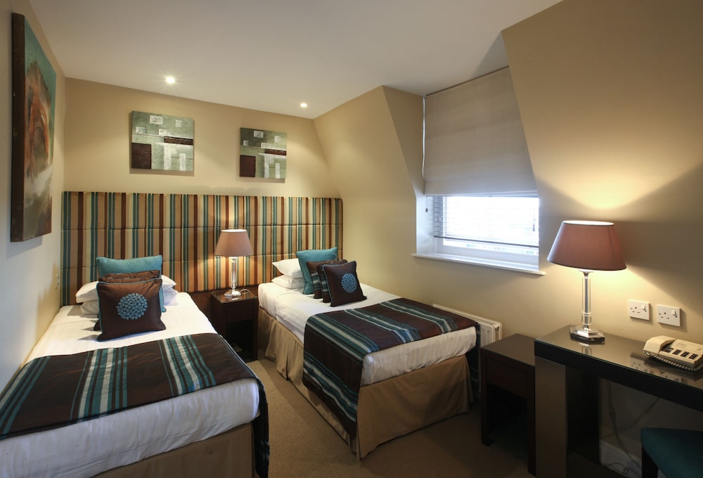 Habitación estándar con 2 camas individuales del hotel New Linden. Foto 6