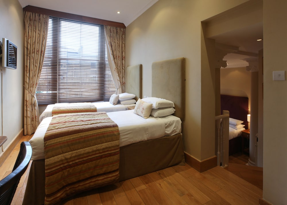 Habitación cuádruple estándar del hotel New Linden