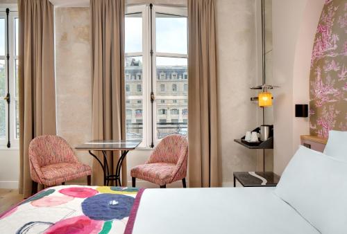 Habitación Doble Superior del hotel Les Rives De Notre Dame. Foto 1