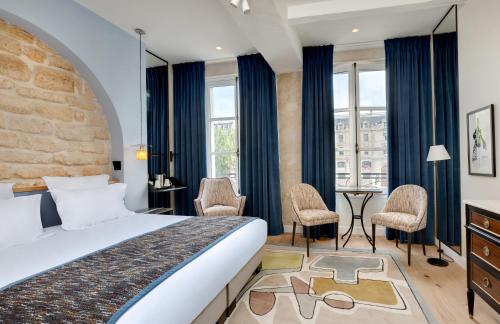 Habitación Doble Superior del hotel Les Rives De Notre Dame. Foto 4