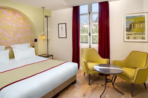 Habitación Doble Superior del hotel Les Rives De Notre Dame. Foto 7