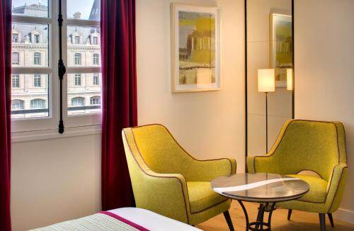 Habitación Doble Superior del hotel Les Rives De Notre Dame. Foto 8
