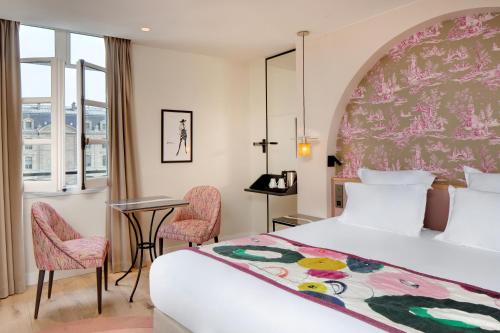 Habitación Doble Superior del hotel Les Rives De Notre Dame. Foto 9