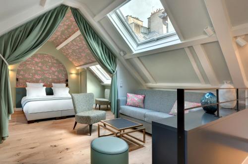 Suite Ático del hotel Les Rives De Notre Dame. Foto 3