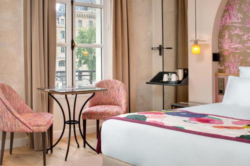 Habitación Doble Estándar del hotel Les Rives De Notre Dame. Foto 4