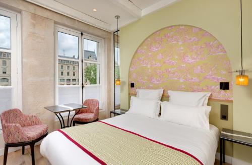 Habitación Doble Estándar del hotel Les Rives De Notre Dame. Foto 5