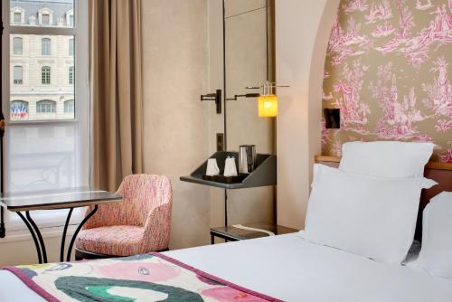 Habitación Doble Estándar del hotel Les Rives De Notre Dame. Foto 18