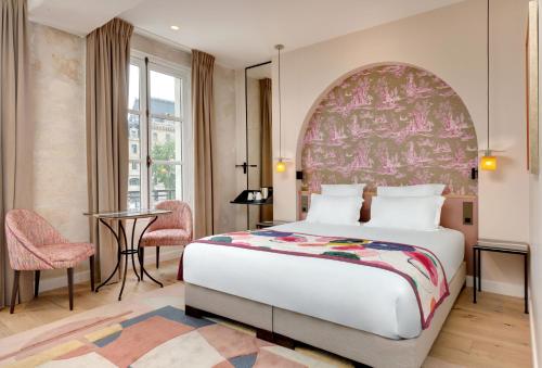 Habitación Doble Superior del hotel Les Rives De Notre Dame. Foto 11
