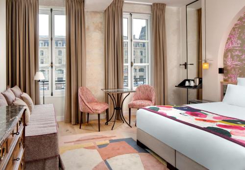 Habitación Doble Superior del hotel Les Rives De Notre Dame. Foto 13