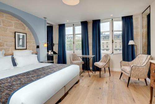Habitación Doble Superior del hotel Les Rives De Notre Dame. Foto 15