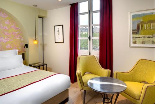 Habitación Doble Superior del hotel Les Rives De Notre Dame. Foto 25
