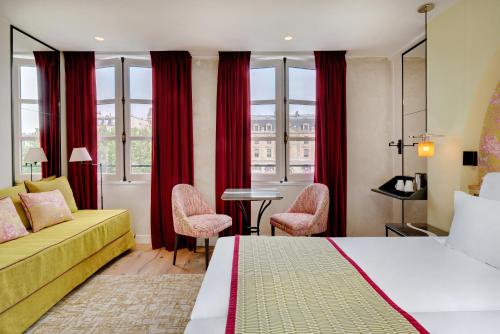 Habitación Doble Superior del hotel Les Rives De Notre Dame. Foto 29