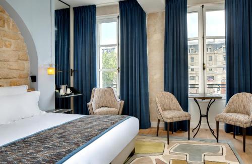 Habitación Doble Superior del hotel Les Rives De Notre Dame. Foto 30