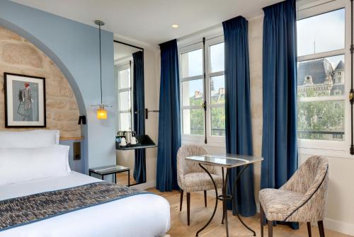 Habitación Doble Superior del hotel Les Rives De Notre Dame. Foto 33