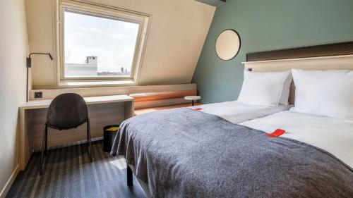 Habitación Doble Pequeña del hotel Citybox Brussels. Foto 4